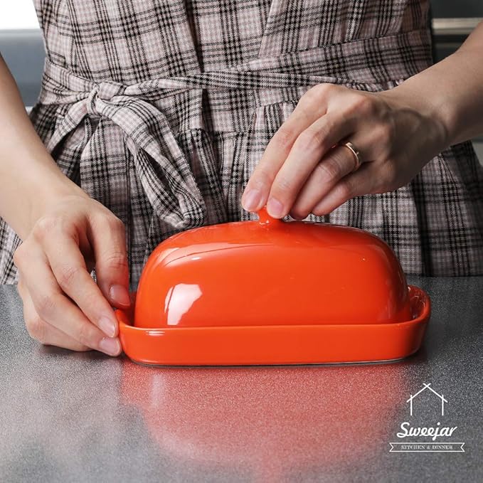 Sweejar Ceramic Butter Dish with Lid for Countertop,Porcelain Butter Keeper with Knob Handle,Butter Container for East/West Coast Butter, 7 inches (Orange)